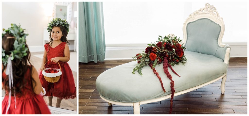 Flower girl in red dress looking in the mirror and floral bouquet on blue chaise lounge at the The White Room in St. Augustine, Florida. Photography by Captured By Lau Photography, a St. Augustine, Florida Wedding Photographer.