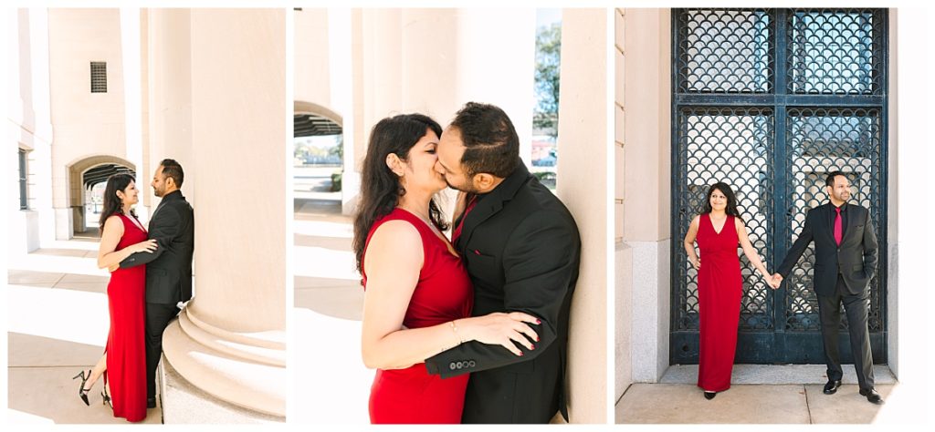 A couple kiss in an outdoor breezeway next to a large column for their engagement session in Jacksonville, FL.