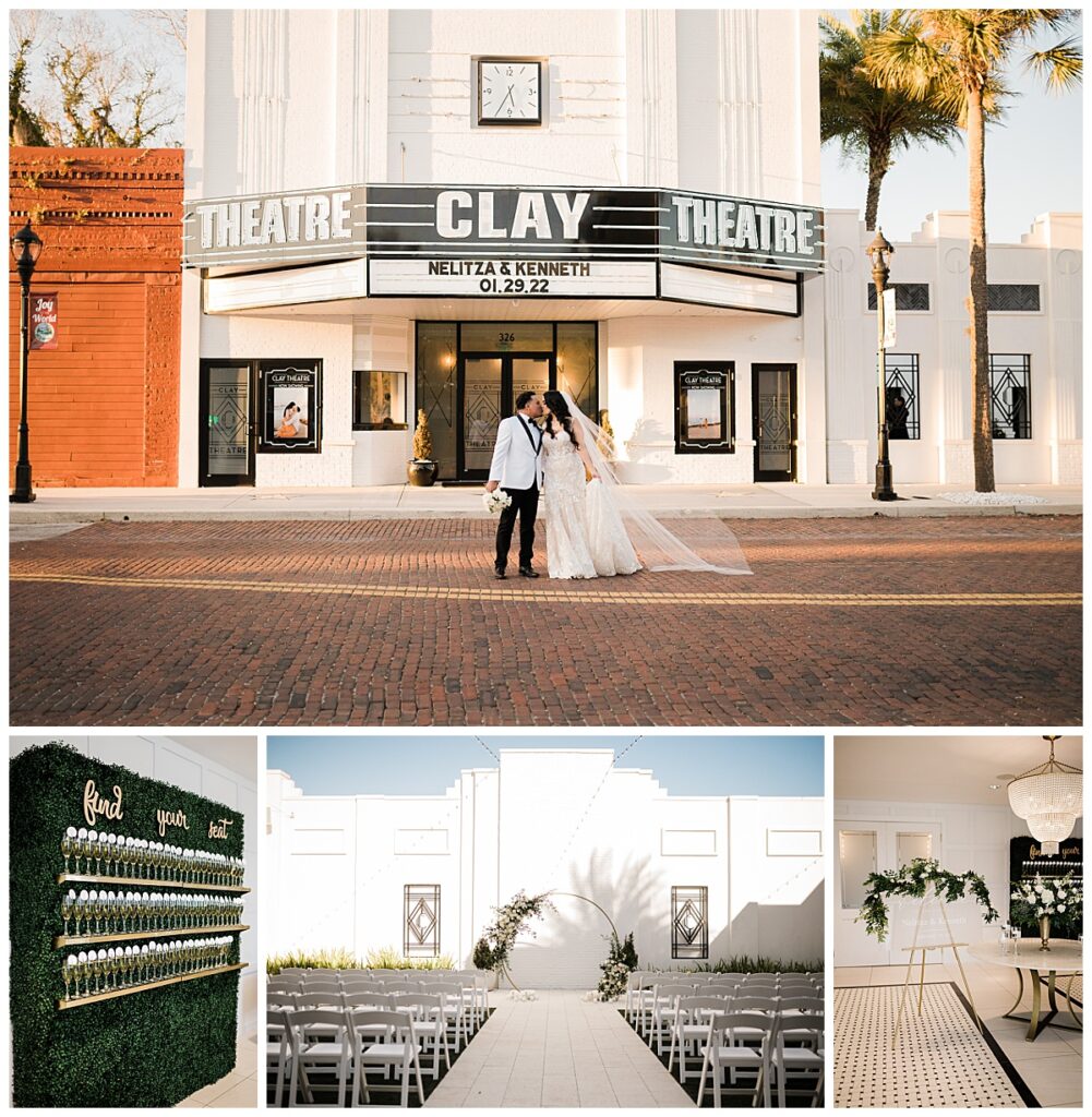 A newlywed couple in a white gown and white tuxedo pose in the early evening in front of The Clay Theatre.