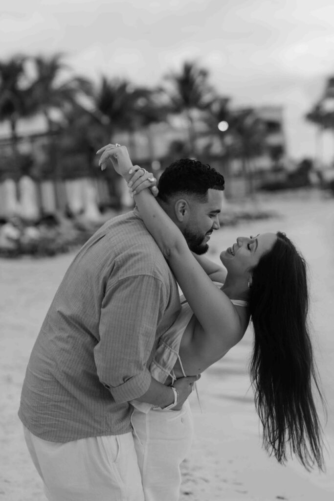 romantic black and white images of couple at the riviera maya hard rock resort hotel in mexico